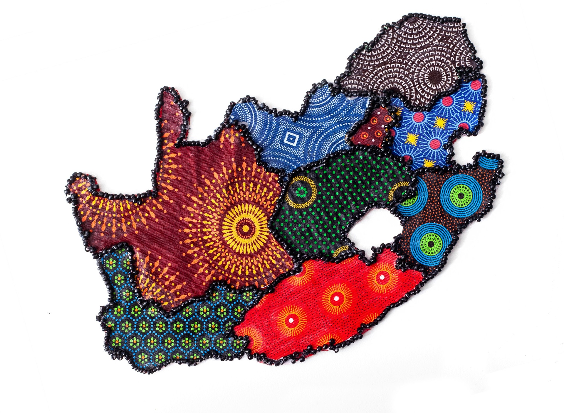 South African provinces in different Iconic Shwe Shwe fabric, outlined with beading. Isolated on white